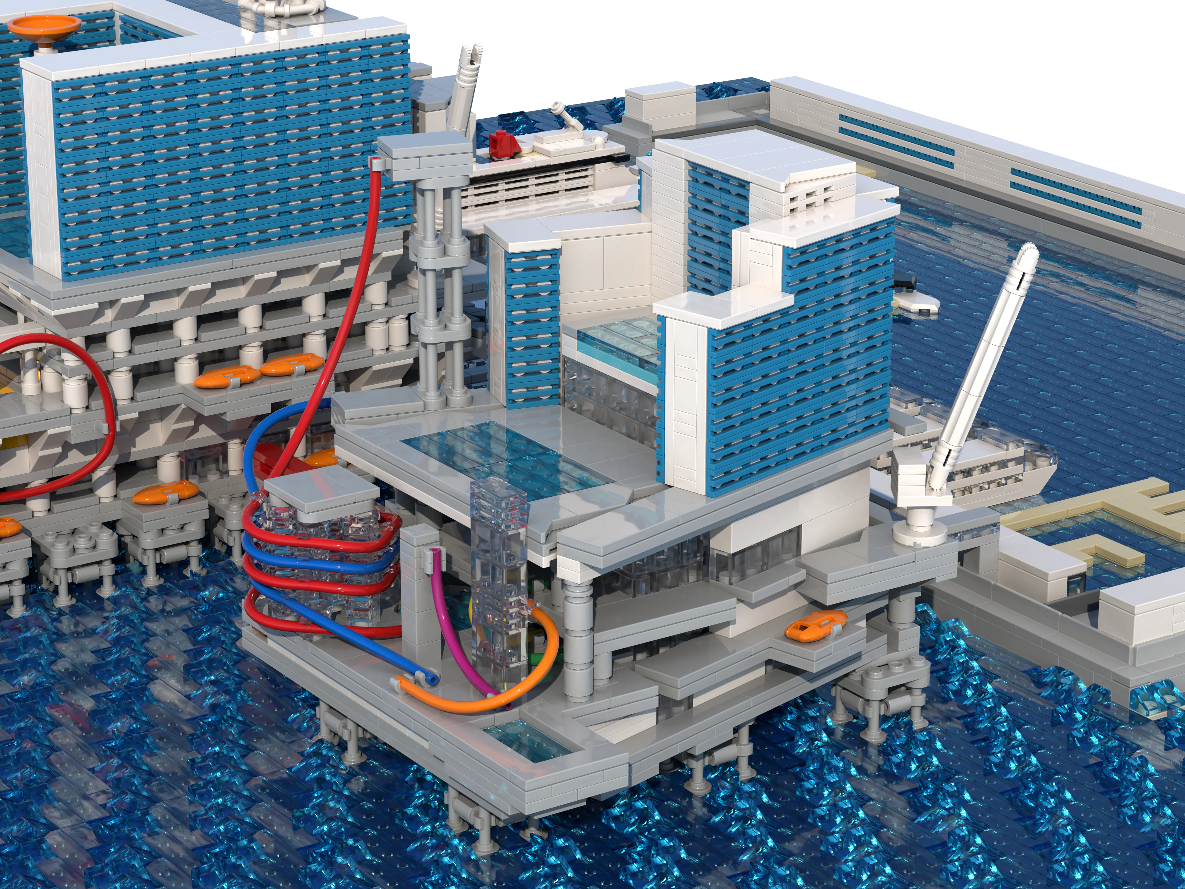 The Riser platform of the LEGO model, with its pools, colourful water slides and hotel